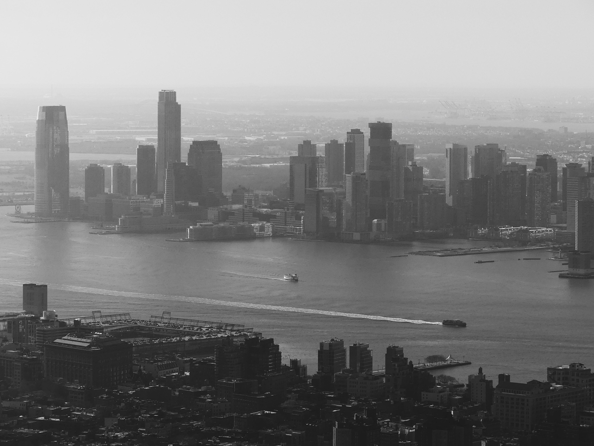 Aerial black and white view of the Manhattan skyline.